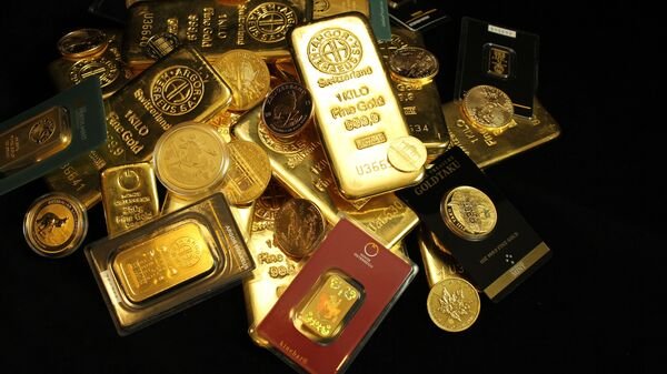 Gold prices held near a two-month low on Thursday, as traders assessed U.S. Federal Reserve officials' mixed remarks on January's hotter-than-expected inflation data that triggered a pull back on hopes of early and deeper interest rate cuts. Spot gold was flat at $1,992.77 per ounce (Oz), as of 0157 GMT, after hitting its lowest since Dec. 13 on Wednesday. U.S. gold futures were also flat at $2,004.60/Oz.