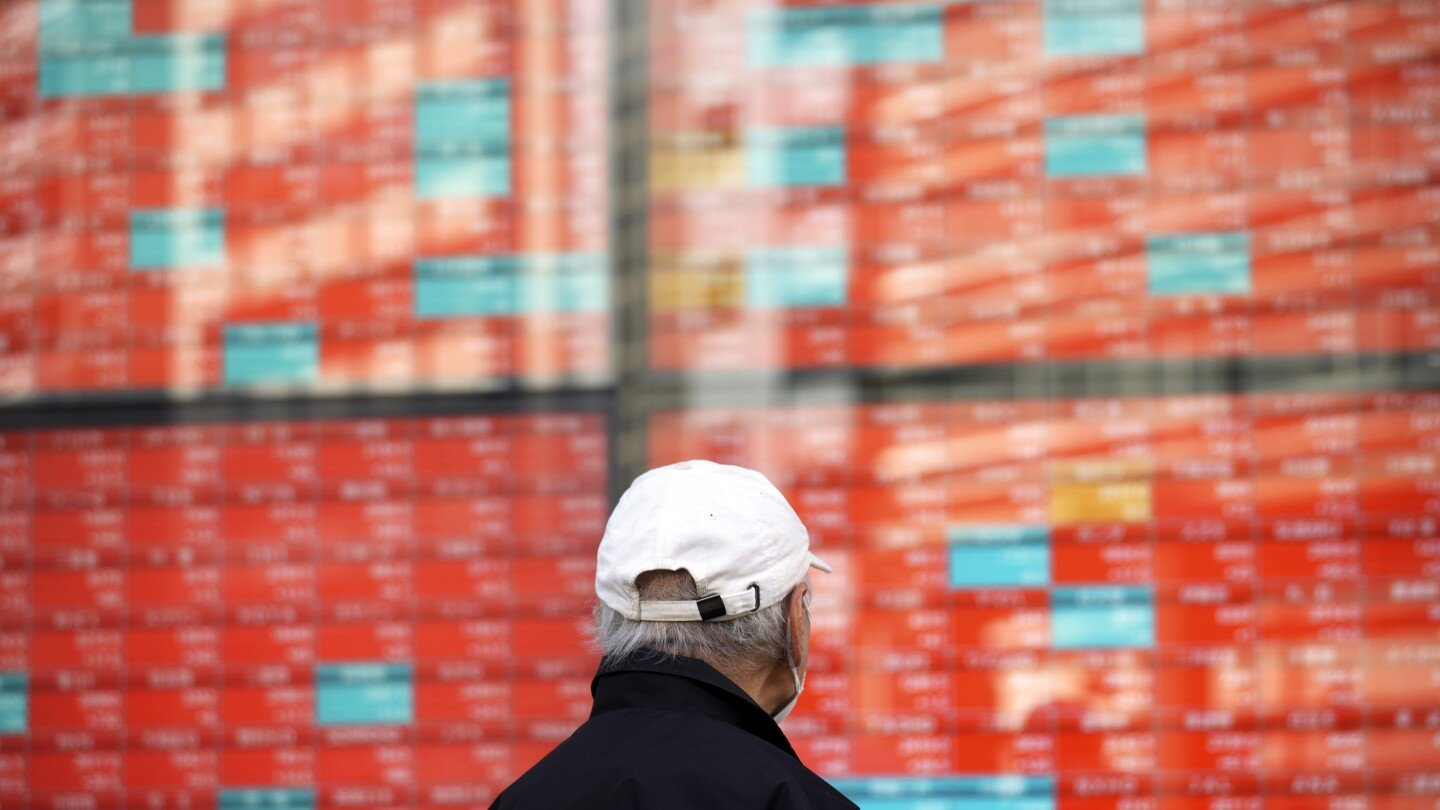 stock-market-today:-asian-shares-follow-wall-st-higher-as-markets-await-a-rate-decision-by-the-fed