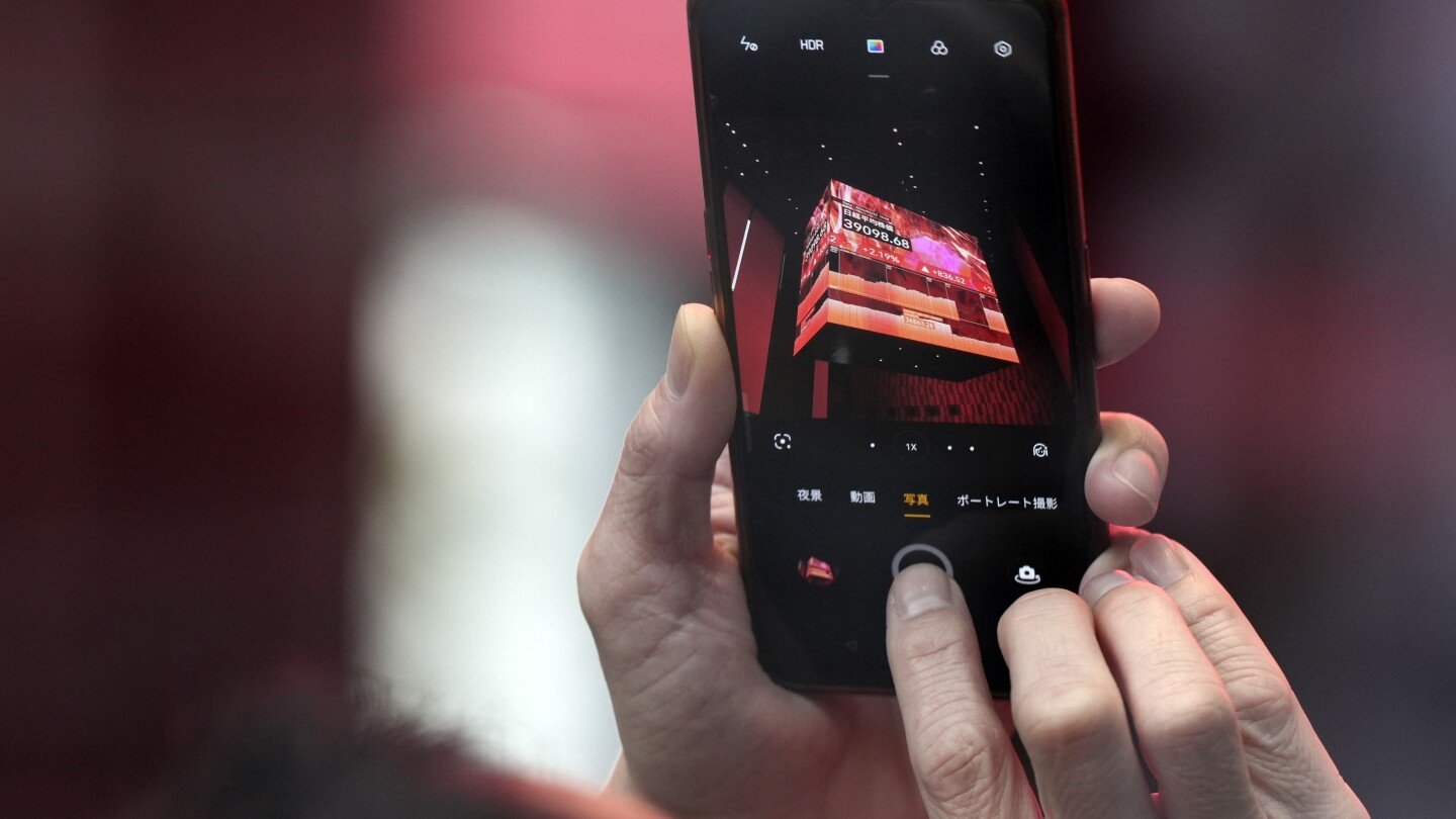 stock-market-today:-asian-shares-rise-after-wall-street-rallies-to-records