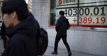 stock-market-today:-asian-shares-are-mixed-as-china-unveils-5%-economic-growth-target-for-2024