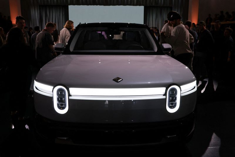 ev-maker-rivian-unveils-smaller,-less-expensive-suvs,-crossovers