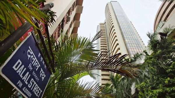 The Bombay Stock Exchange (BSE), right, stands on Dalal street in Mumbai. Photographer: Adeel Halim/Bloomberg (BSE)