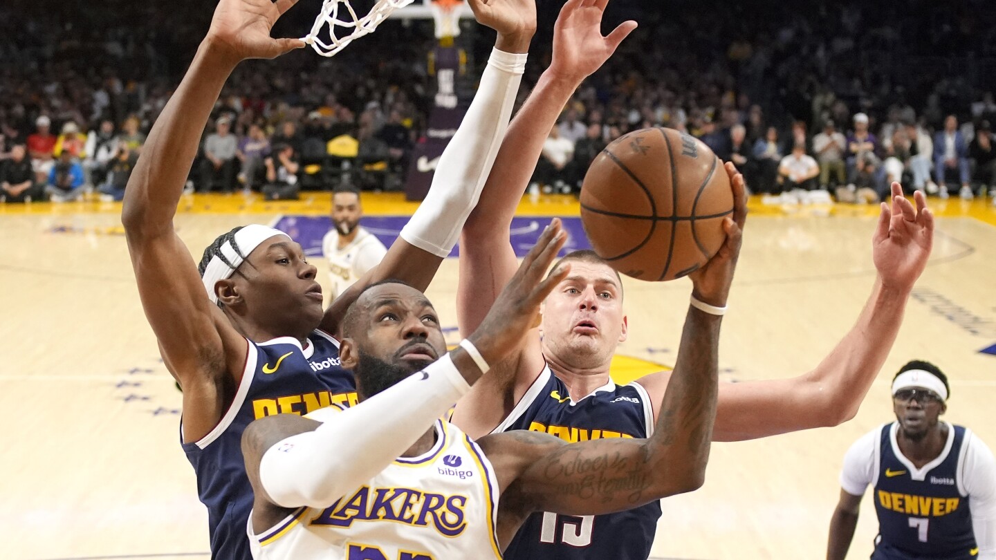 lebron-scores-30,-and-the-lakers-avoid-1st-round-elimination-with-a-119-108-win-over-champion-denver