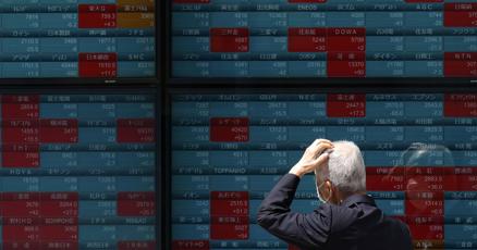 stock-market-today:-asian-markets-wobble-after-fed-sticks-with-current-interest-rates