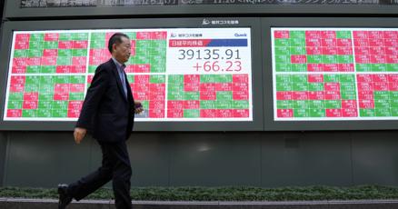 stock-market-today:-wall-street-hangs-near-its-records-in-another-quiet-day-of-trading
