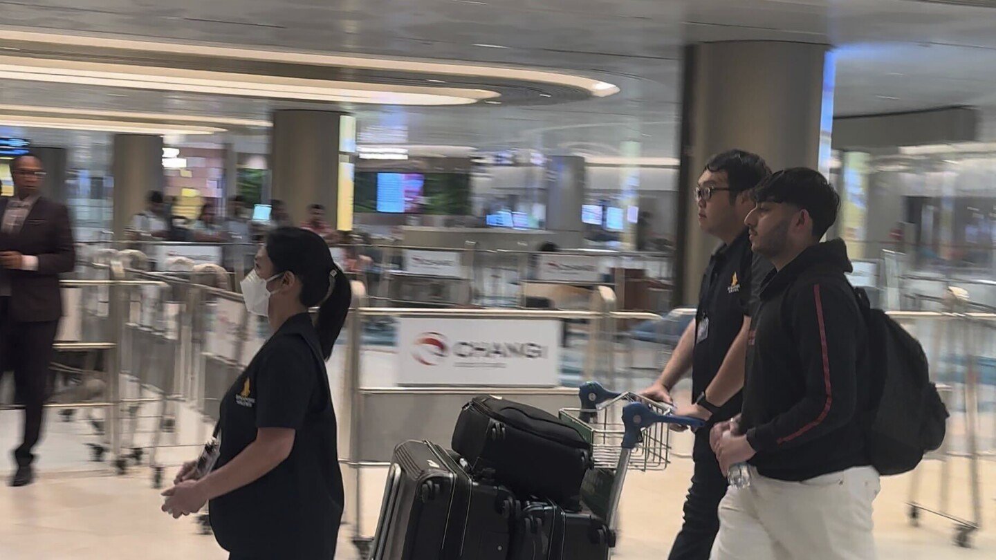 most-of-passengers-from-battered-singapore-airlines-jetliner-arrive-in-singapore-from-bangkok