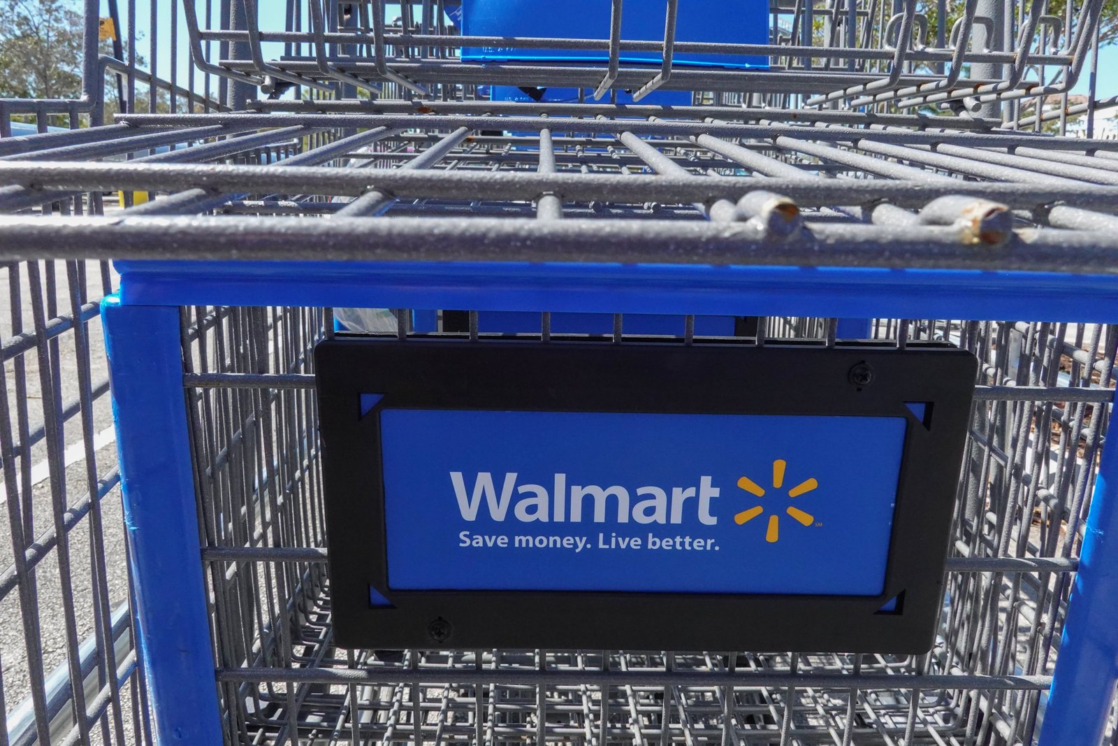 A Walmart Supercenter cart sits outside of the store on February 20, 2024, in Hallandale Beach, Florida. 