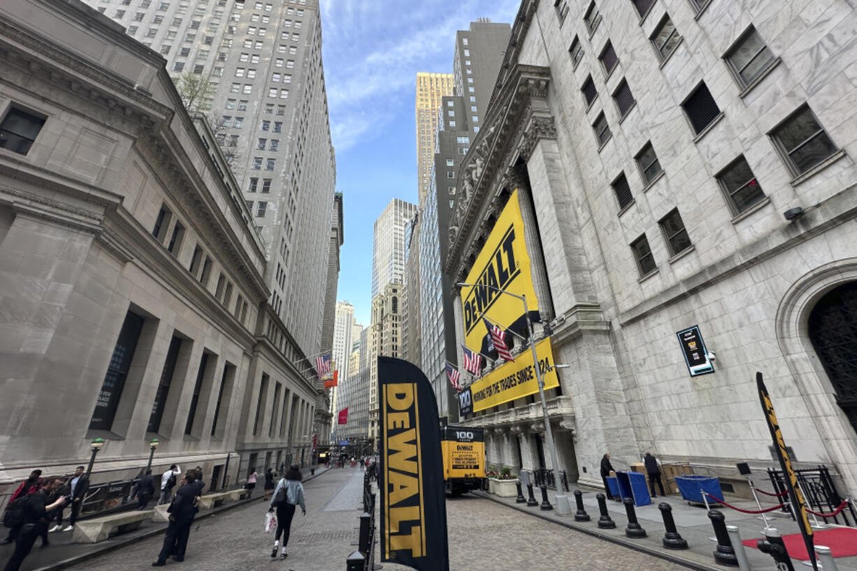 The front of the New York Stock Exchange is adorned with signs for the tool maker DeWalt in honor of the 100th year anniversary of the company on Tuesday, May 14, 2024. Markets on Wall Street inched slightly higher ahead of the release of more inflation data from the U.S. government.