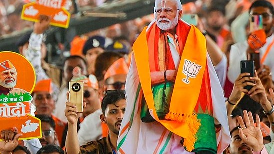 Stock market: BJP supporters during a public meeting of Prime Minister Narendra Modi for Lok Sabha elections, in Dhar, Madhya Pradesh.(PTI)