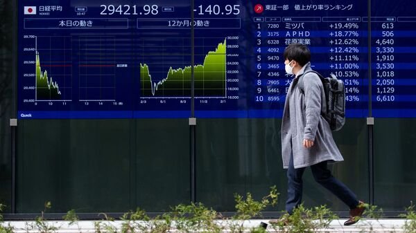 The domestic market benchmark indices Sensex and Nifty 50, are expected to open in green on Wednesday amid mixed global cues. (AP Photo/Hiro Komae) (AP)