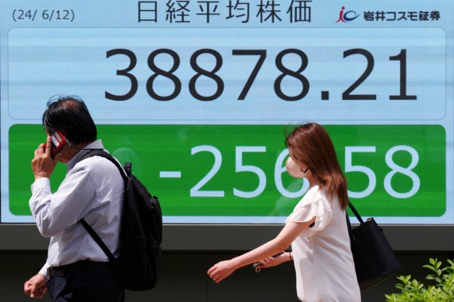 stock-market-today:-asian-shares-are-mixed-ahead-of-a-fed-decision-on-interest-rates