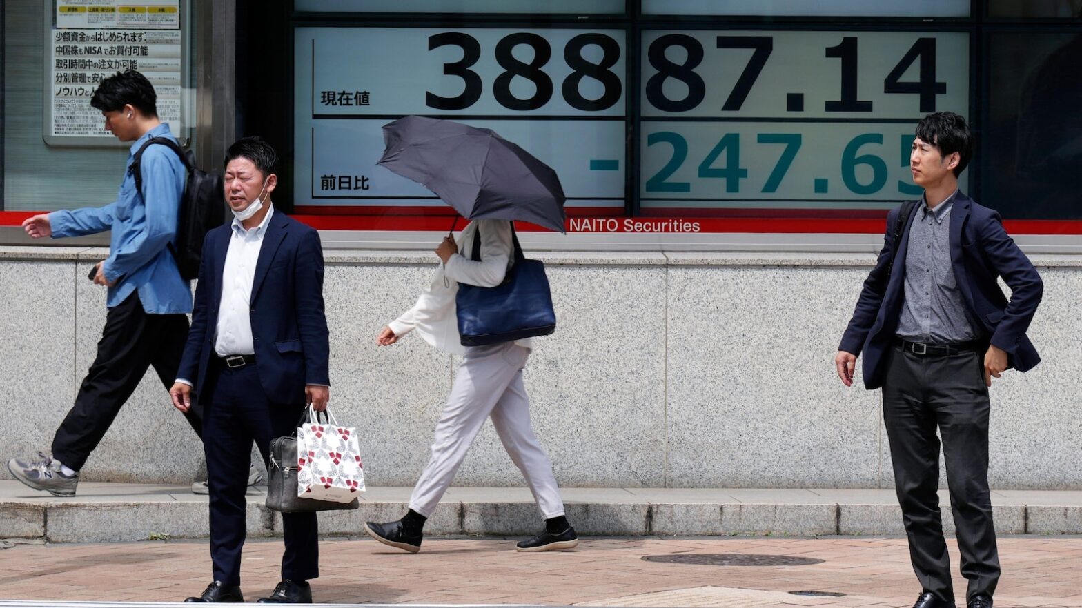 stock-market-today:-asian-shares-are-mixed-ahead-of-a-fed-decision-on-interest-rates