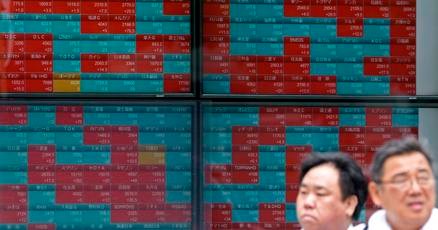 stock-market-today:-wall-street-edges-back-from-its-records