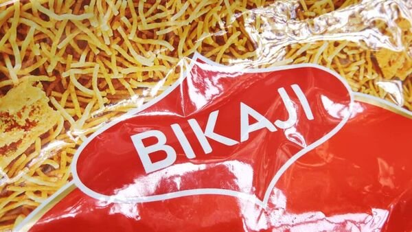 MarketsMojo picks Bikaji Foods as the top pick for June, expecting high returns for medium-risk investors with less than 30% weightage in the sector. FMCG sector growth expected in FY2025. (Shutterstock)
