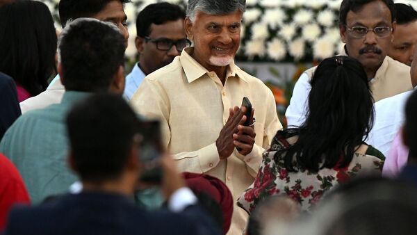 N Chandrababu Naidu, leader of the Telugu Desam Party, center, attends a swearing-in ceremony at the Rashtrapati Bhawan in New Delhi (Bloomberg)