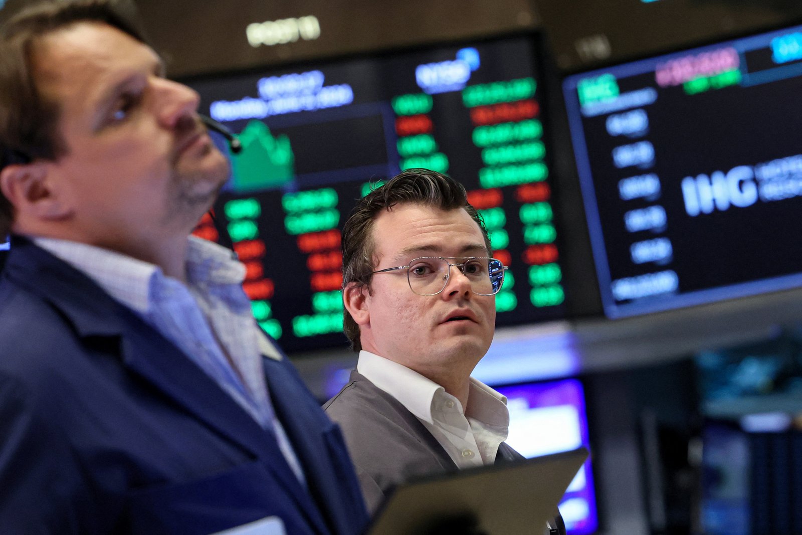 Traders work on the floor of the NYSE in New York