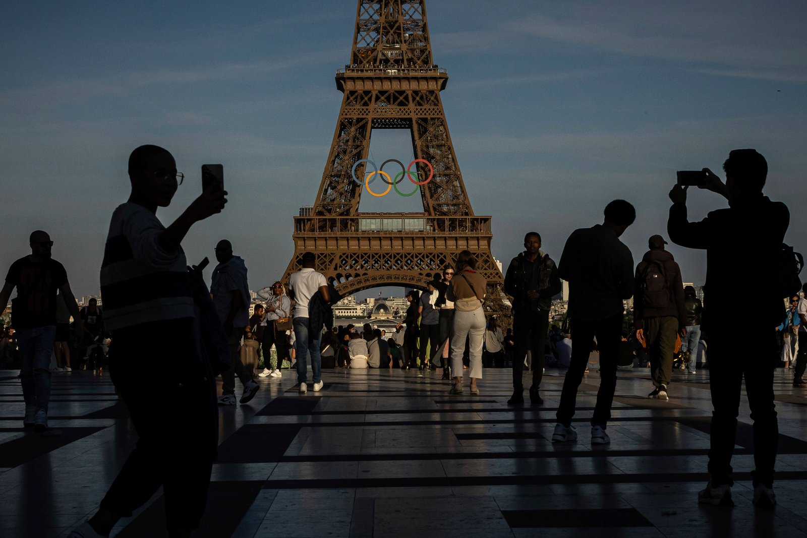 The Olympic rings are seen on the Eiffel Tower Friday, June 7, 2024 in Paris. The Paris Olympics organizers mounted the rings on the Eiffel Tower on Friday as the French capital marks 50 days until the start of the Summer Games. The 95-foot-long and 43-foot-high structure of five rings, made entirely of recycled French steel, will be displayed on the south side of the 135-year-old historic landmark in central Paris, overlooking the Seine River. (AP Photo/Aurelien Morissard)