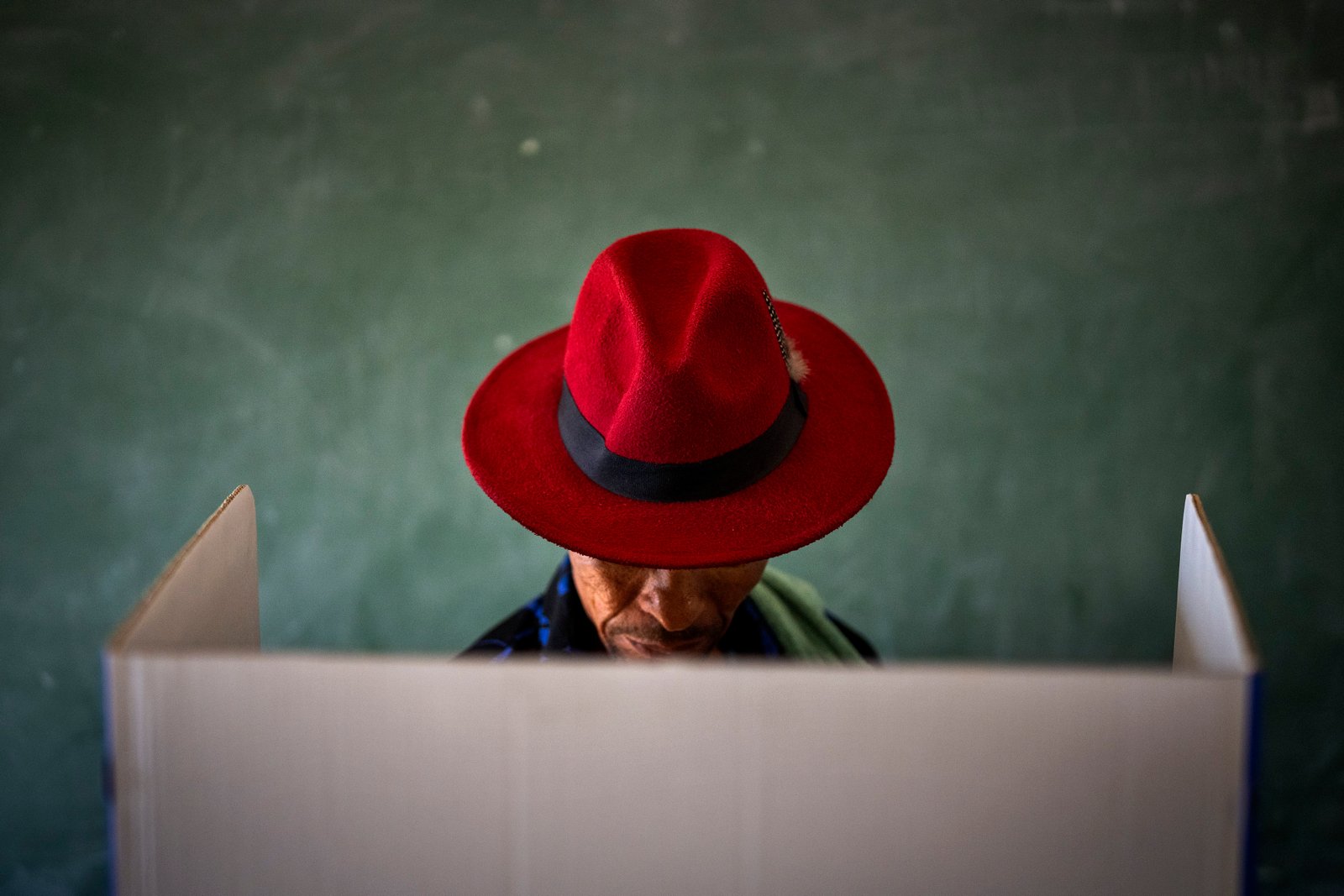 A voter fills out a ballot paper during general elections in Nkandla, Kwazulu Natal, South Africa, Wednesday May 29, 2024. South Africans are voting in an election seen as their country's most important in 30 years, and one that could put them in unknown territory in the short history of their democracy, the three-decade dominance of the African National Congress party being the target of a new generation of discontent in a country of 62 million people — half of whom are estimated to be living in poverty. (AP Photo/Emilio Morenatti)