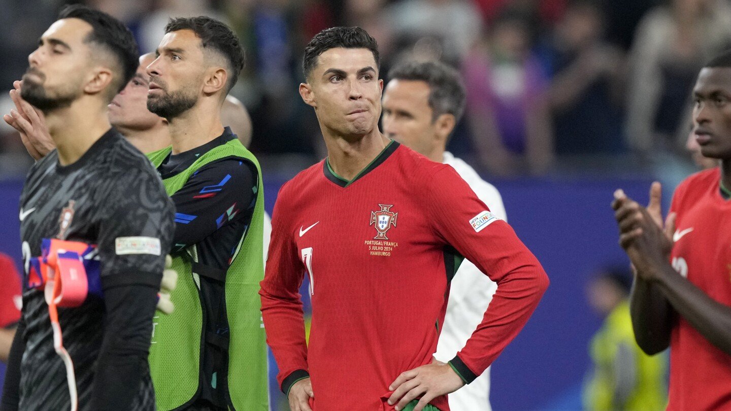 ronaldo-comforts-disconsolate-pepe-as-portugal’s-veterans-make-cruel-exit-at-euro-2024
