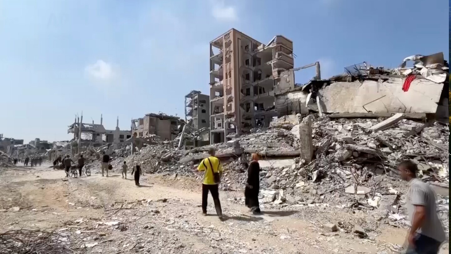 emergency-crews-recover-bodies-in-gaza-city-as-negotiations-continue-in-egypt