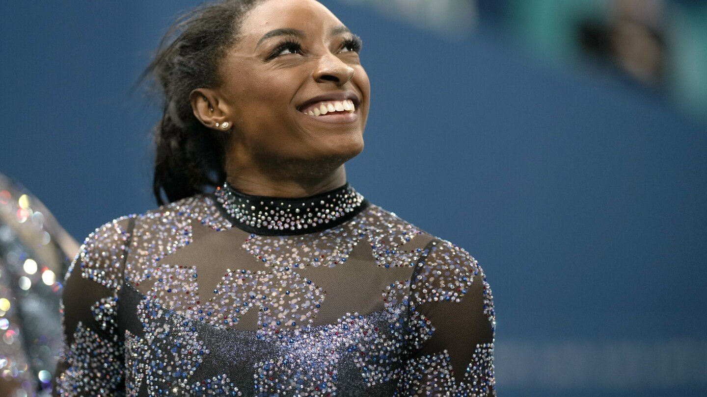 simone-biles-to-compete-on-all-four-events-despite-calf-injury-during-olympic-team-finals