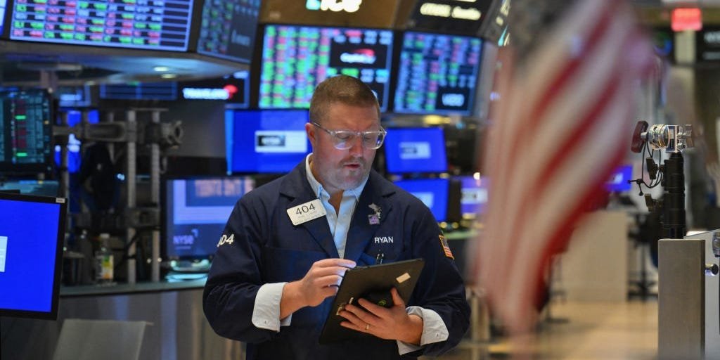 stock-market-today:-us-stocks-edge-lower-after-best-day-of-the-year-as-volatile-week-wraps-up