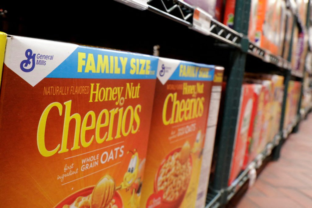 FILE PHOTO: FILE PHOTO: General Mills cereals rest on a shelf inside of a grocery store in New York