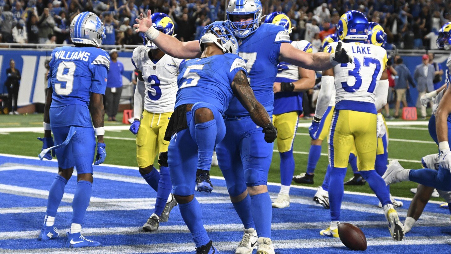 montgomery’s-1-yard-touchdown-run-in-ot-lifts-lions-to-26-20-win-over-rams