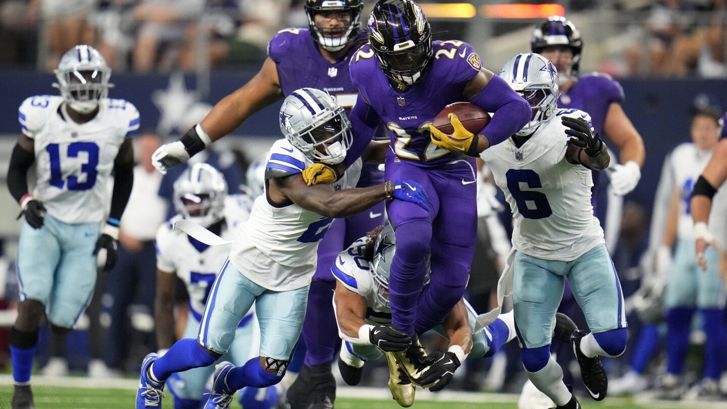 henry-rushes-for-151-yards,-2-tds-as-ravens-hang-on-to-beat-cowboys-28-25