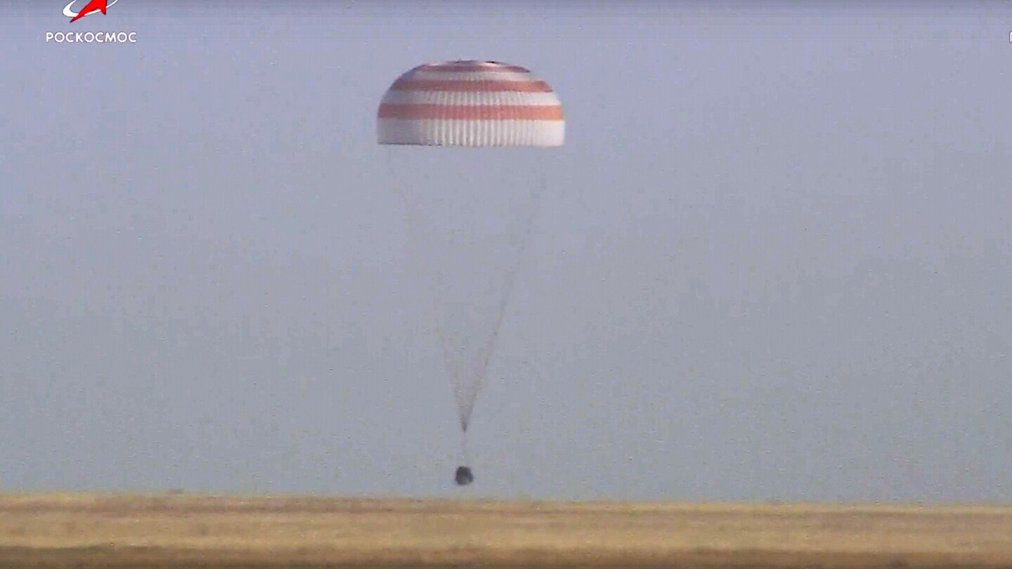 a-soyuz-capsule-with-2-russians-and-1-american-from-the-international-space-station-returns-to-earth