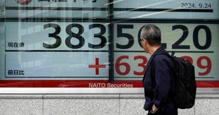 stock-market-today:-wall-street-hangs-near-records-after-chinese-stocks-soar