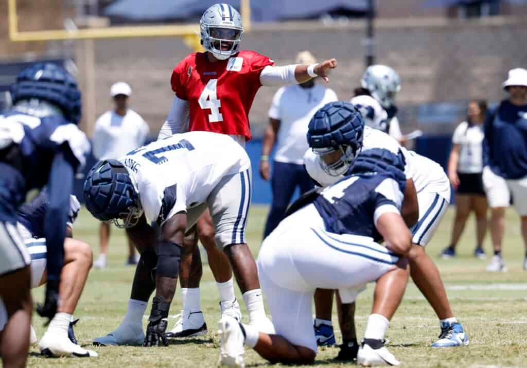 OXNARD, CALIFORNIA - JULY 30: Quarterback Dak Prescott #4 of the Dallas Cowboys calls a play during a training session on July 30, 2024 in Oxnard, California. 