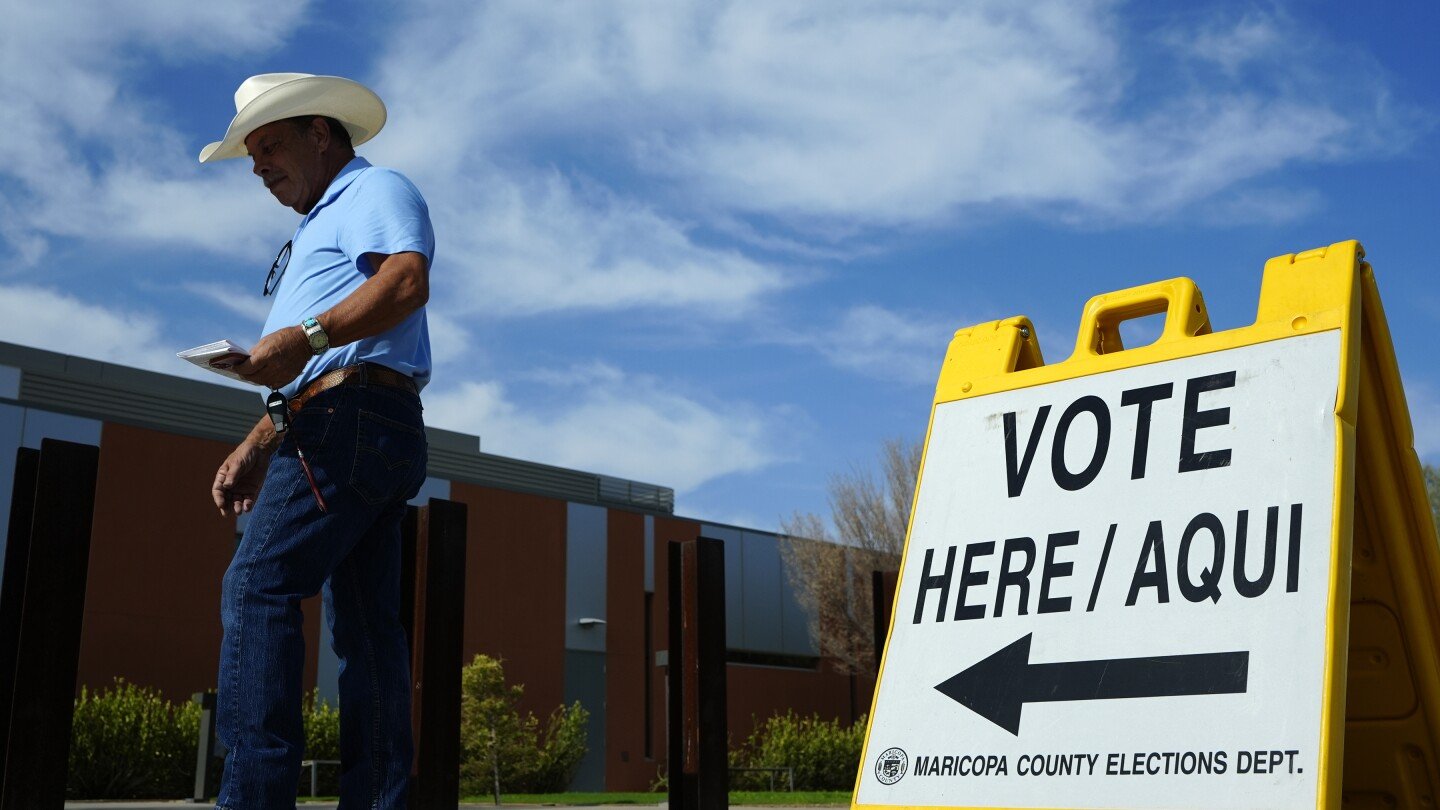 early-in-person-voting-begins-in-arizona,-drawing-visits-from-the-presidential-campaigns