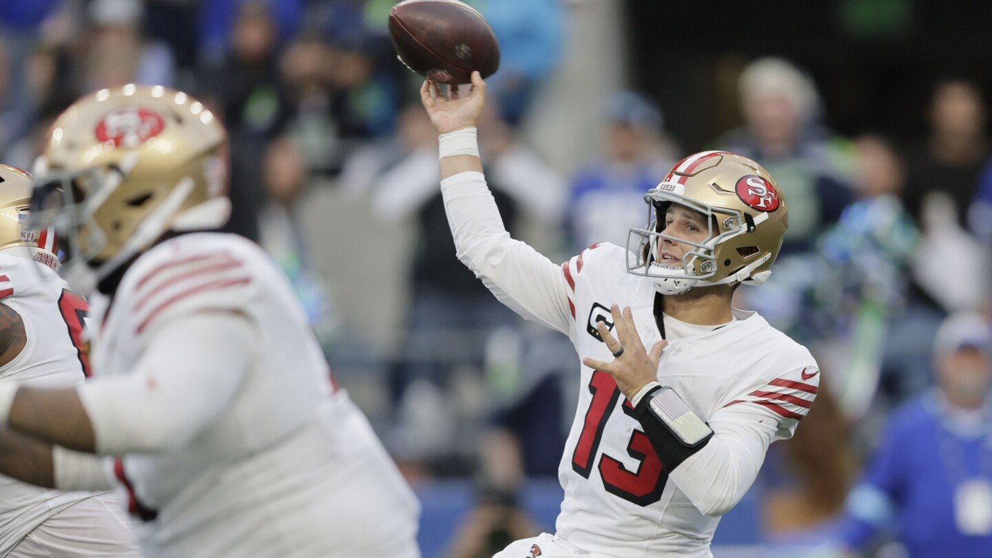 brock-purdy-throws-for-3-tds-and-the-49ers-beat-the-seahawks-36-24-to-move-atop-division