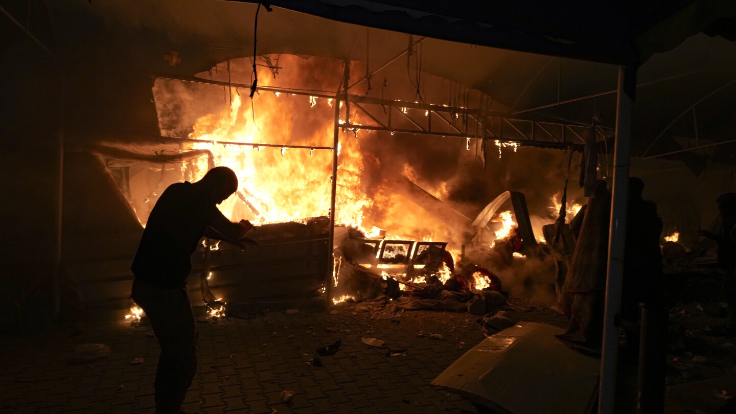 israeli-strike-on-hospital-tent-camp-kills-4-and-ignites-a-fire-that-burns-dozens