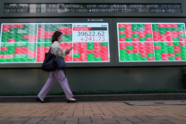 stock-market-today:-asian-shares-are-mostly-higher-after-wall-st-powers-to-more-records