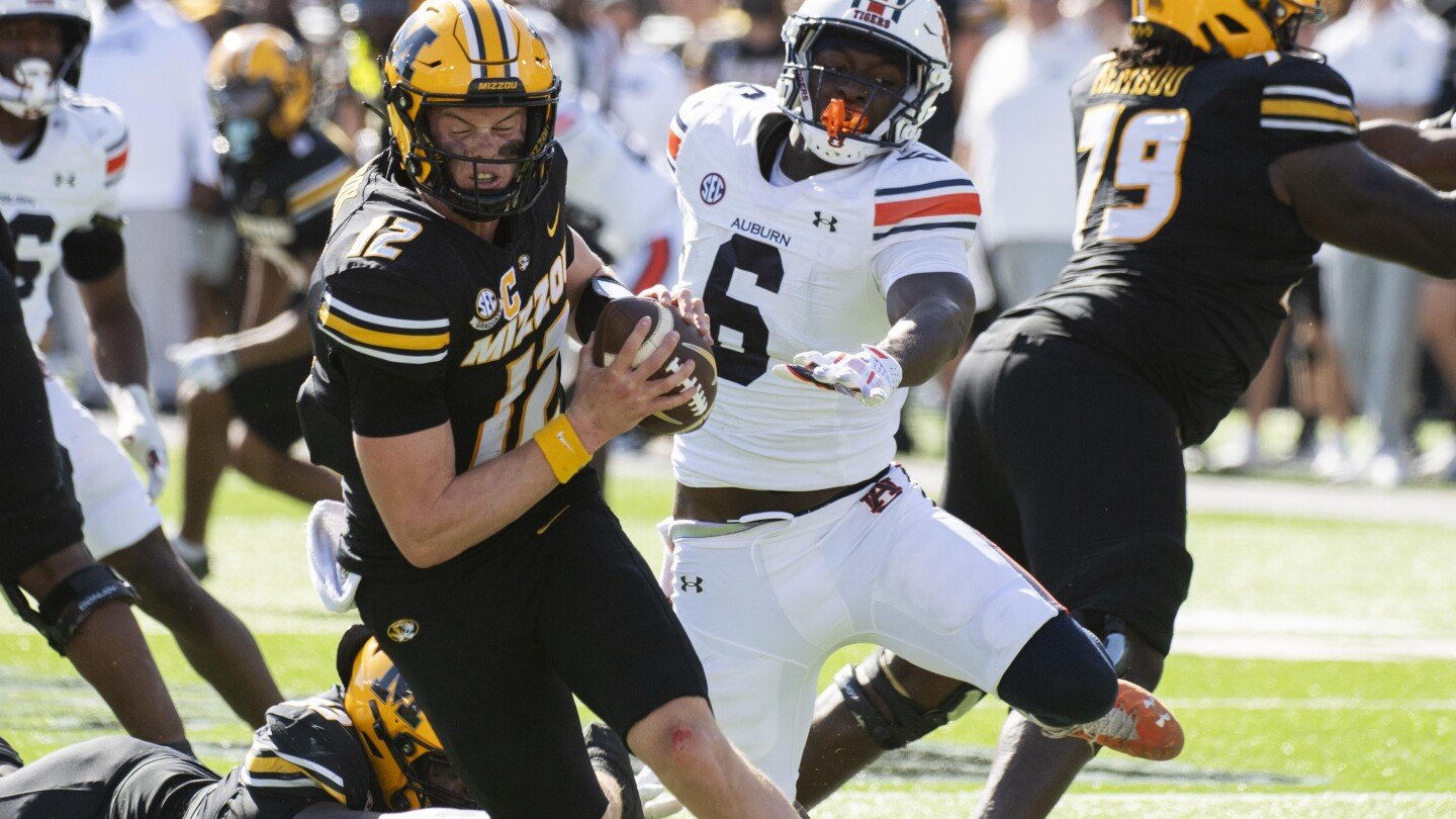 brady-cook,-hobbled-by-an-injury,-rallies-no.-19-mizzou-to-a-21-17-win-over-auburn