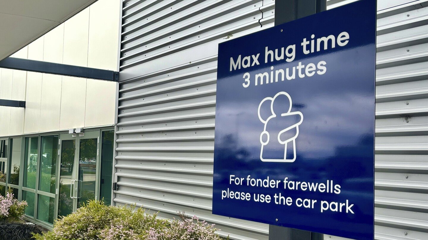 new-zealand-airport-imposes-cuddle-cap-with-3-minute-limit-on-goodbye-hugs-to-avoid-traffic-jams
