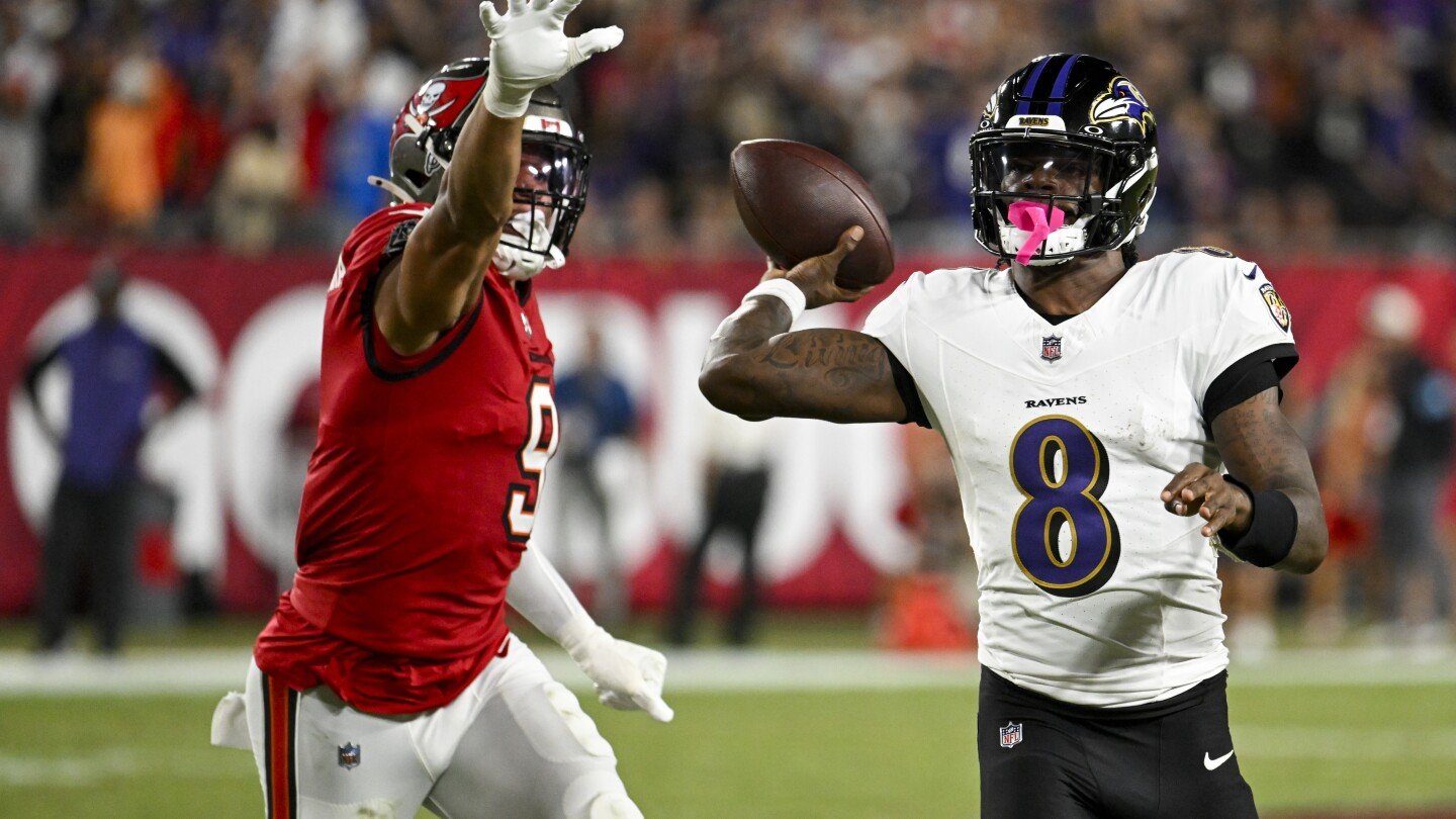 lamar-jackson-throws-for-281-yards,-5-tds-to-lead-streaking-ravens-to-41-31-victory-over-buccaneers