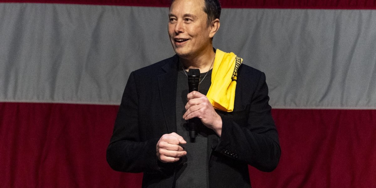 tesla-shares-take-a-break-from-soaring-as-investors-punish-michael-kors-owner-for-court-loss