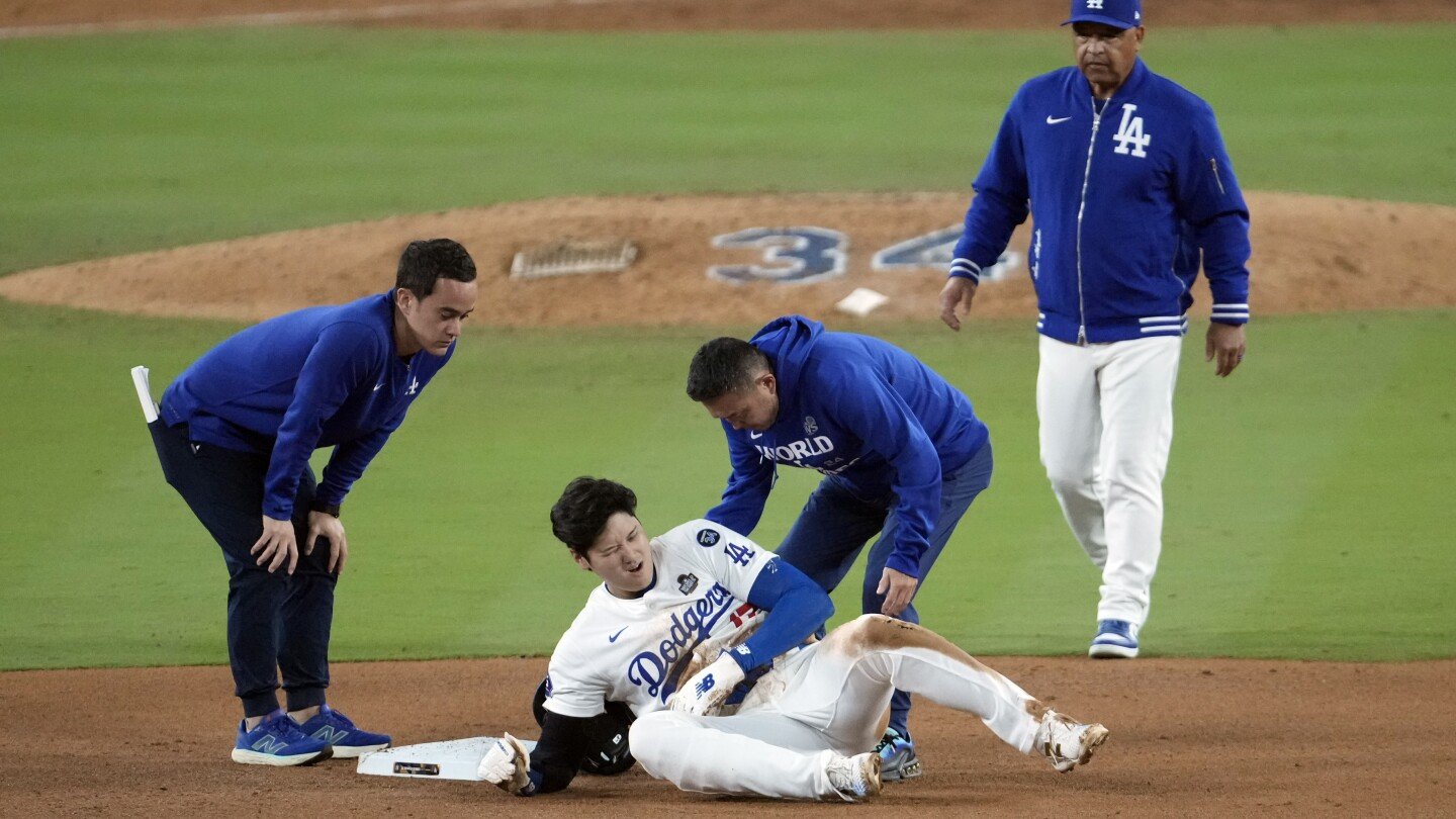 shohei-ohtani-injures-left-arm-sliding-into-second-during-world-series-game-2,-severity-uncertain