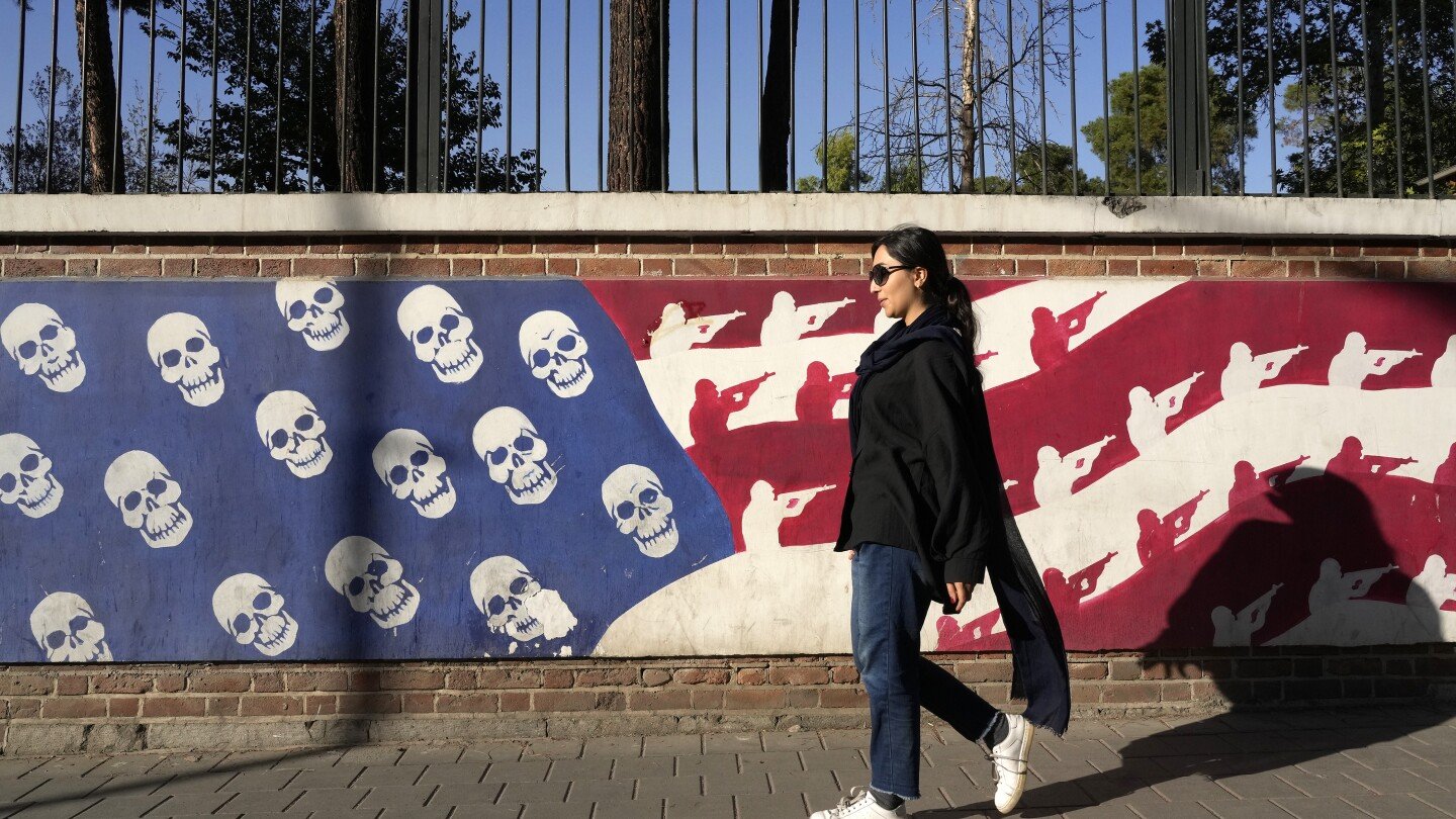 locked-in-mideast-wars-and-battered-by-sanctions,-iran-is-wary-over-us-presidential-election