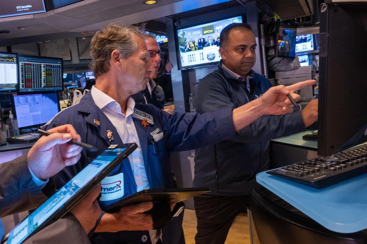 stock-market-today:-s&p-500,-nasdaq-climb-as-tesla-jumps,-nvidia-earnings-loom