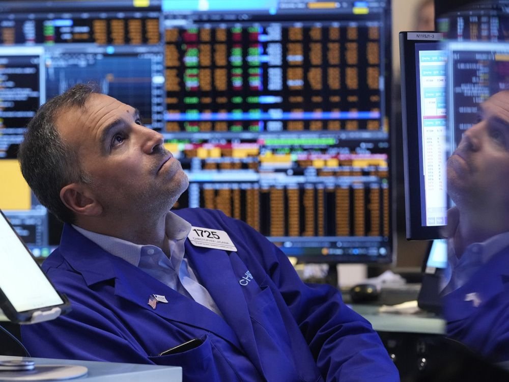 A trader working on the floor of the New York Stock Exchange.