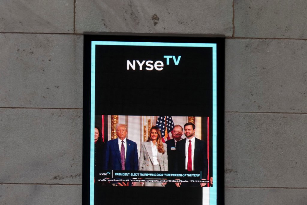 watch:-trump-rings-opening-bell-at-ny-stock-exchange,-celebrates-time-magazine-cover