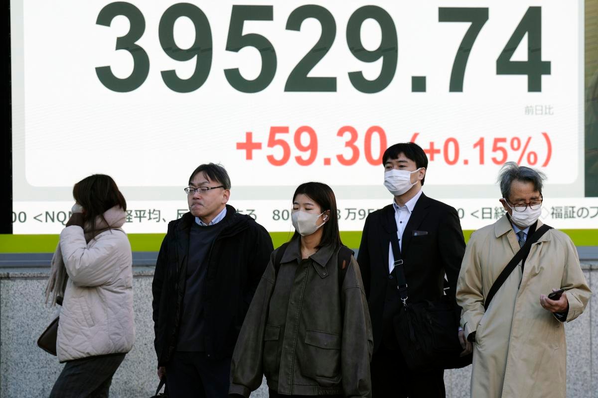 stock-market-today:-asian-shares-fall-as-china-reports-lackluster-data,-while-bitcoin-hits-new-highs
