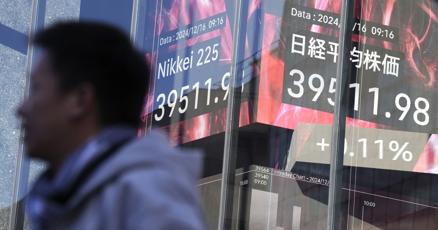 stock-market-today:-asian-shares-are-mixed-after-nasdaq-sets-a-record-ahead-of-fed-meeting