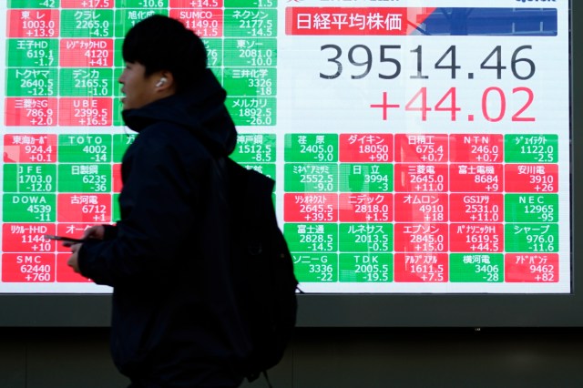 stock-market-today:-asian-shares-are-mixed-after-nasdaq-sets-a-record-ahead-of-fed-meeting