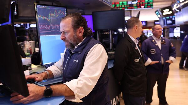 wall-street-today:-us-stocks-slip-after-strong-retail-sales-data