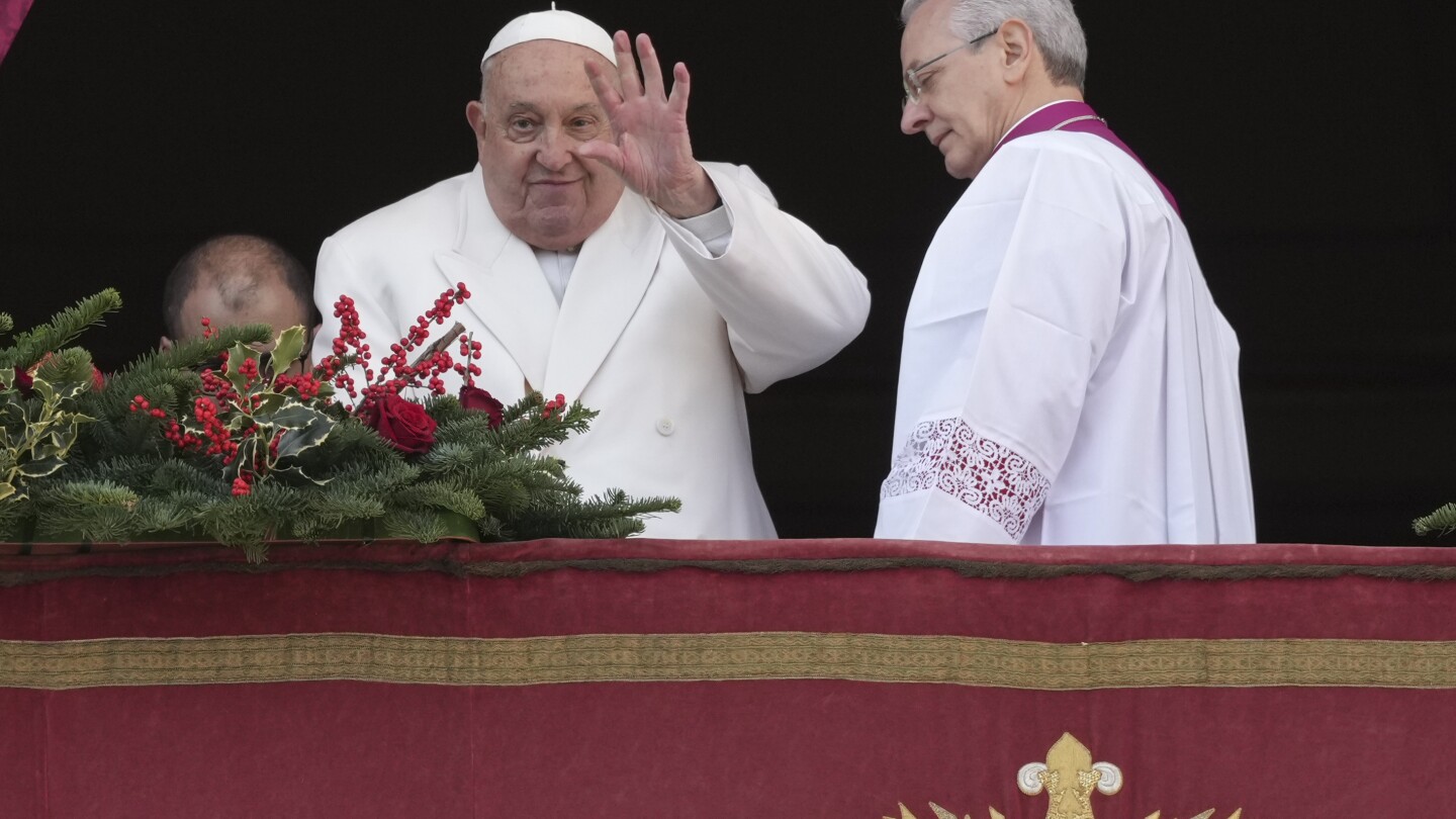 pilgrims-traverse-vatican-holy-door-as-christmas-marks-the-start-of-the-2025-holy-year